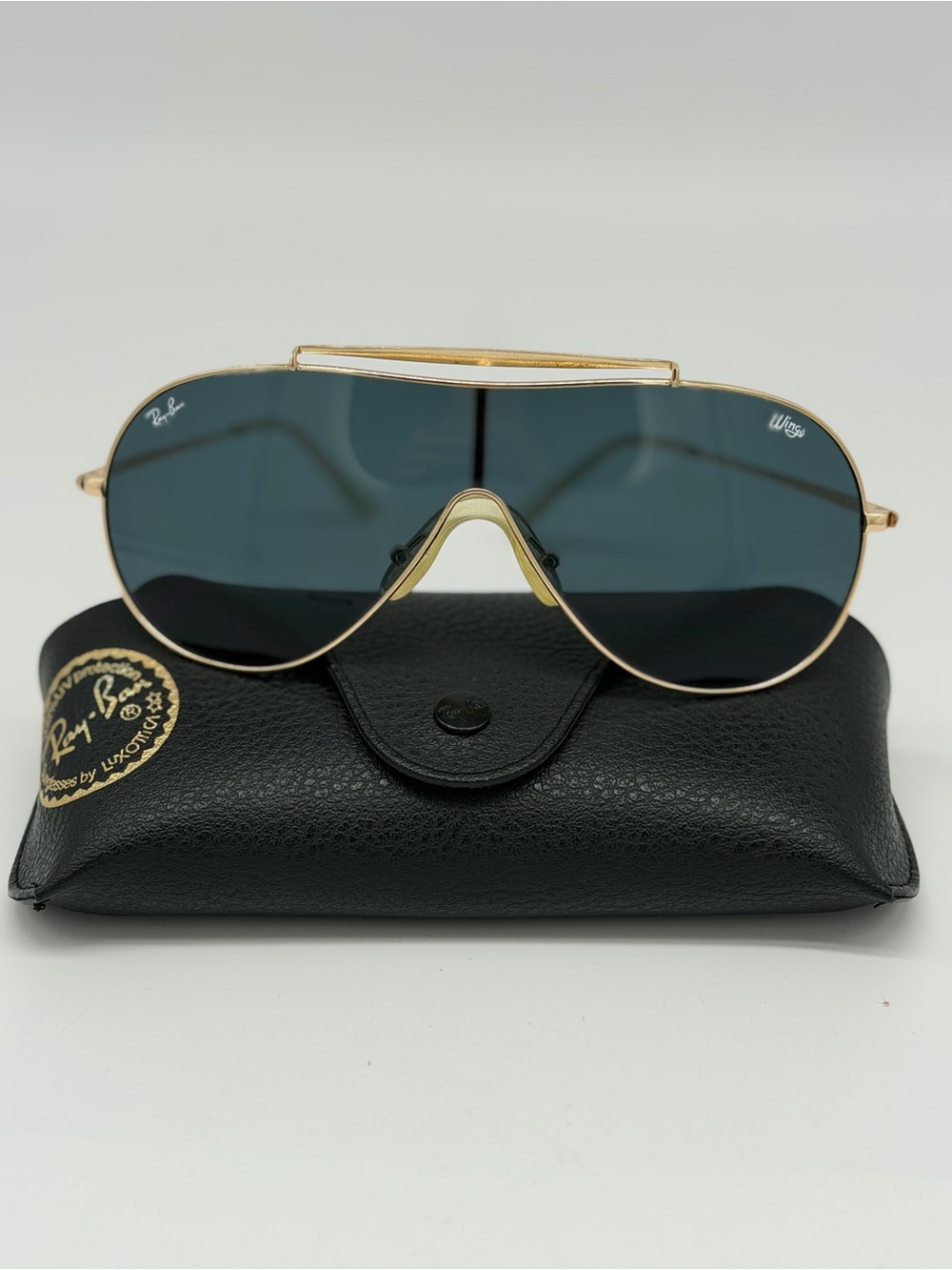 Ray-Ban Wings Gold Frame Sunglasses with Dark Green Lenses